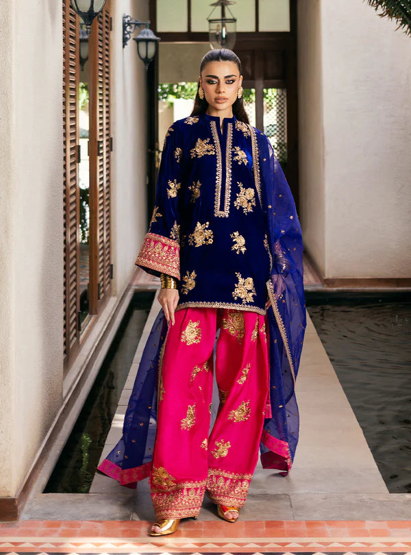 Jia Navy Velvet Short Kurta with Pink Raw Silk Shalwar and Purple Dupatta by Zainab Chottani from Velvet Stitched ’25 Collection at Pakistanimoda.com.
