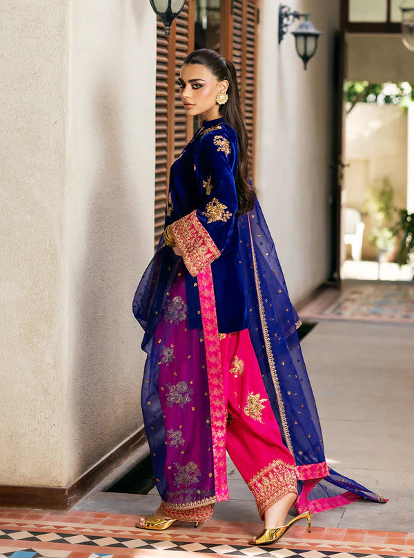 Jia Navy Velvet Short Kurta with Pink Raw Silk Shalwar and Purple Dupatta by Zainab Chottani from Velvet Stitched ’25 Collection at Pakistanimoda.com.