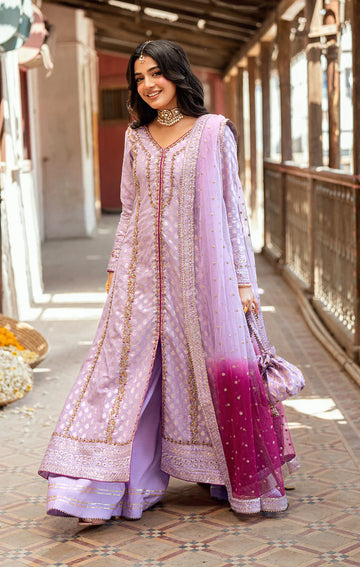 KAYA lavender front-open Pakistani dress with gold embroidery, hand-embellished karandi shirt, flared azaar pants, and embroidered net dupatta – by Pakistanimoda.com