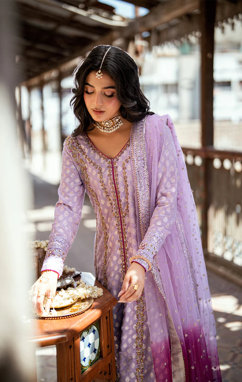 KAYA lavender front-open Pakistani dress with gold embroidery, hand-embellished karandi shirt, flared azaar pants, and embroidered net dupatta – by Pakistanimoda.com