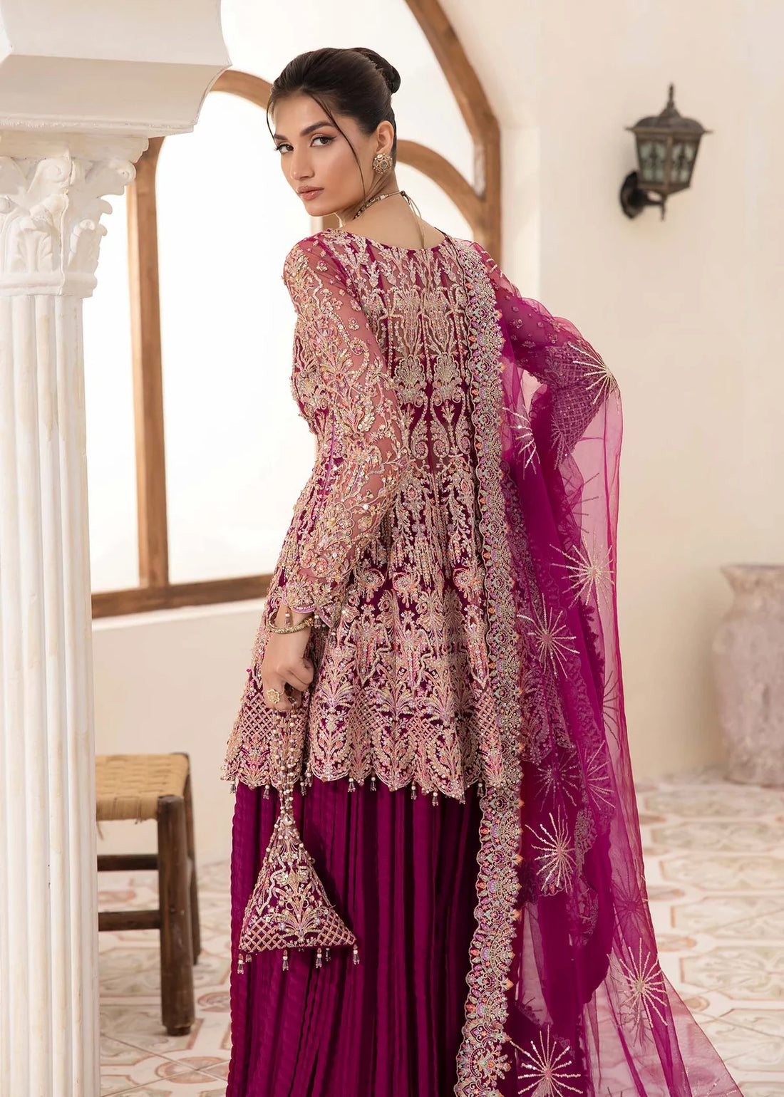 Plum embroidered Pakistani peplum top with crushed pants and net dupatta – elegant formal wear for women in USA, UK, and Canada.