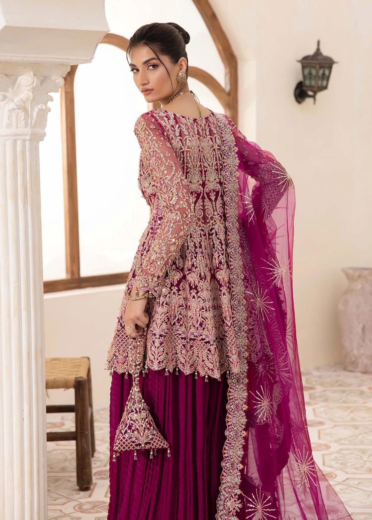 Plum embroidered Pakistani peplum top with crushed pants and net dupatta – elegant formal wear for women in USA, UK, and Canada.