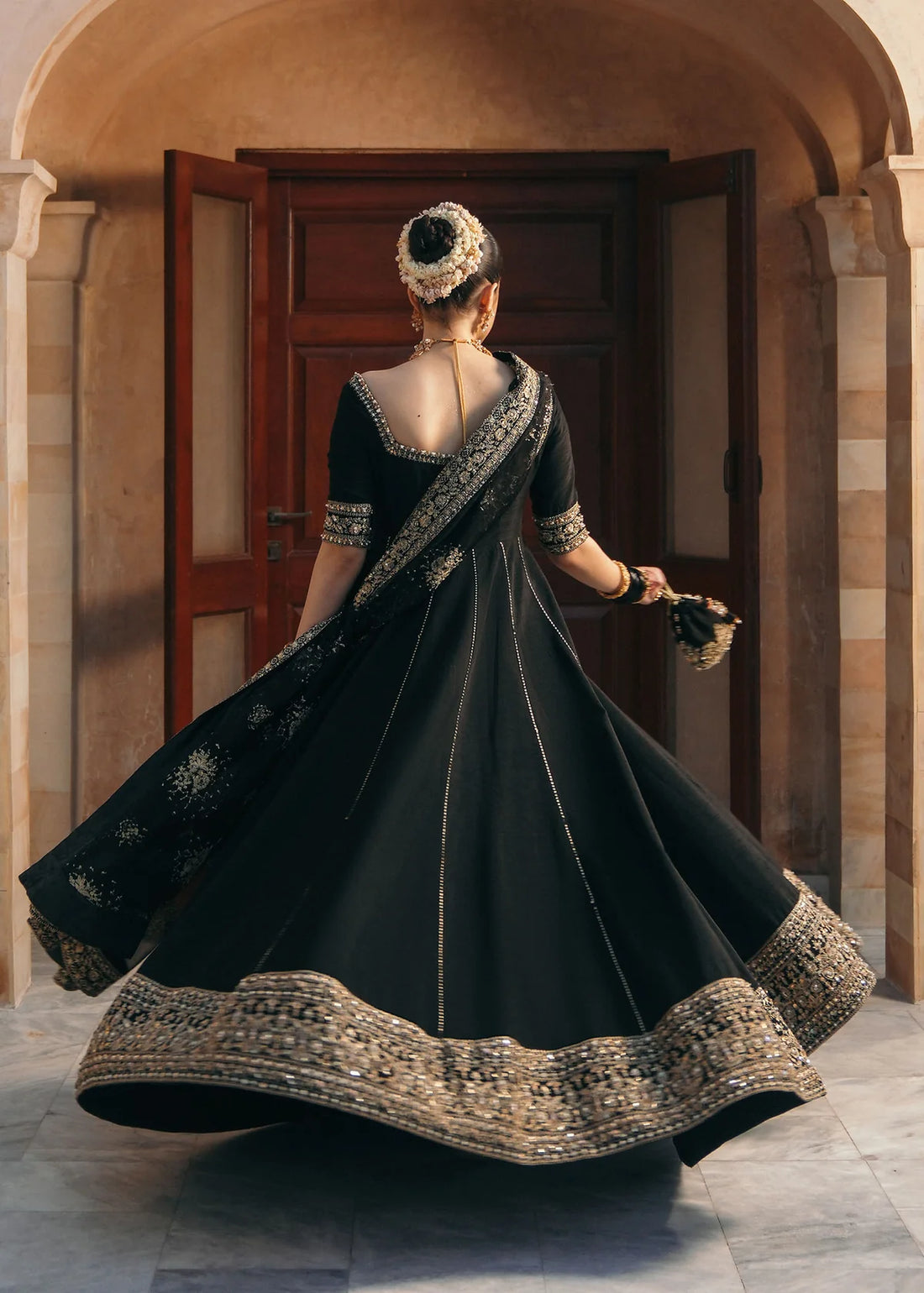 Kajal black Korean fabric pishwas with embroidered neckline, churidar pajama, and dupatta by Kanwal Malik from the Saheli Luxury Pret Collection.