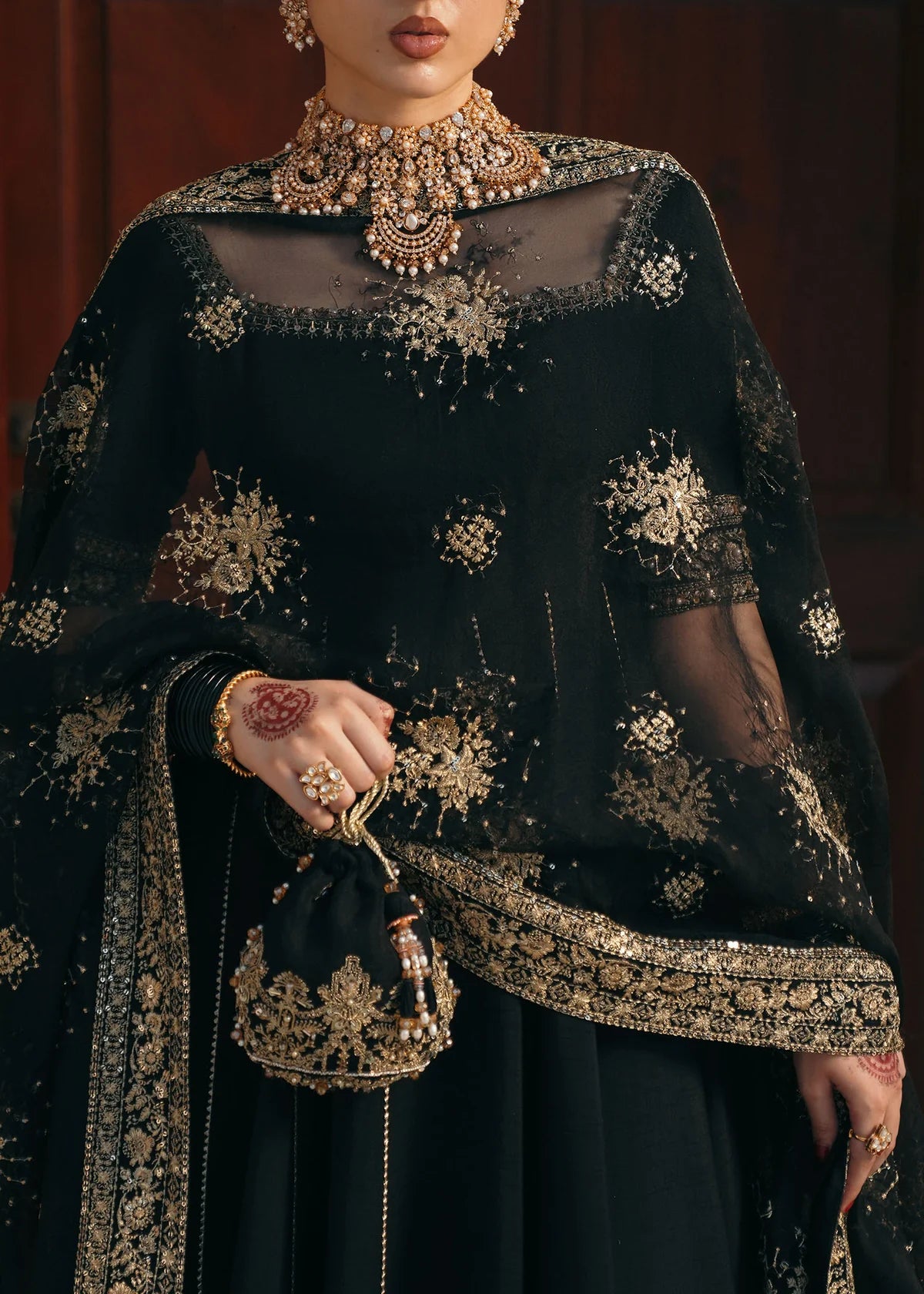 Kajal black Korean fabric pishwas with embroidered neckline, churidar pajama, and dupatta by Kanwal Malik from the Saheli Luxury Pret Collection.