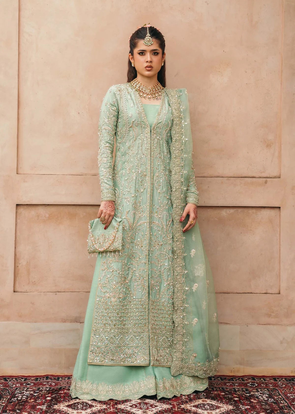 Kaneez aqua front-open three-piece silk party wear suit with flared pants and embroidered organza dupatta by Kanwal Malik, ideal for festive occasions.