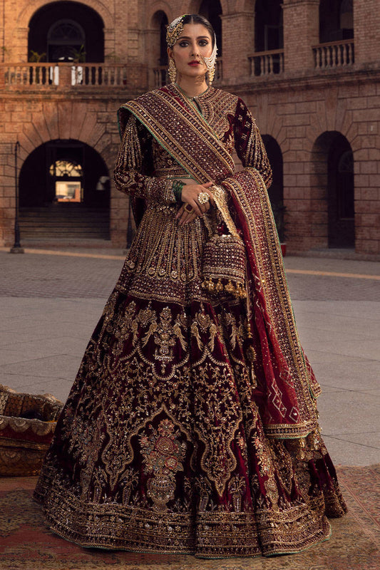 Kasturi - Divine Grace in Maroon Bridal Lehenga By MNR