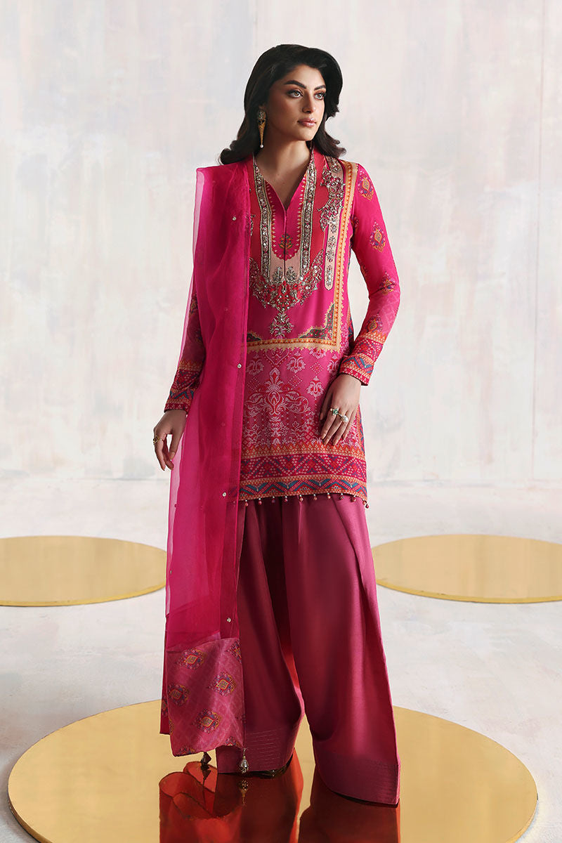 Shocking pink Pakistani printed grip shirt with Korean silk pants and organza dupatta – festive Eid outfit for women in USA, UK, and Canada.