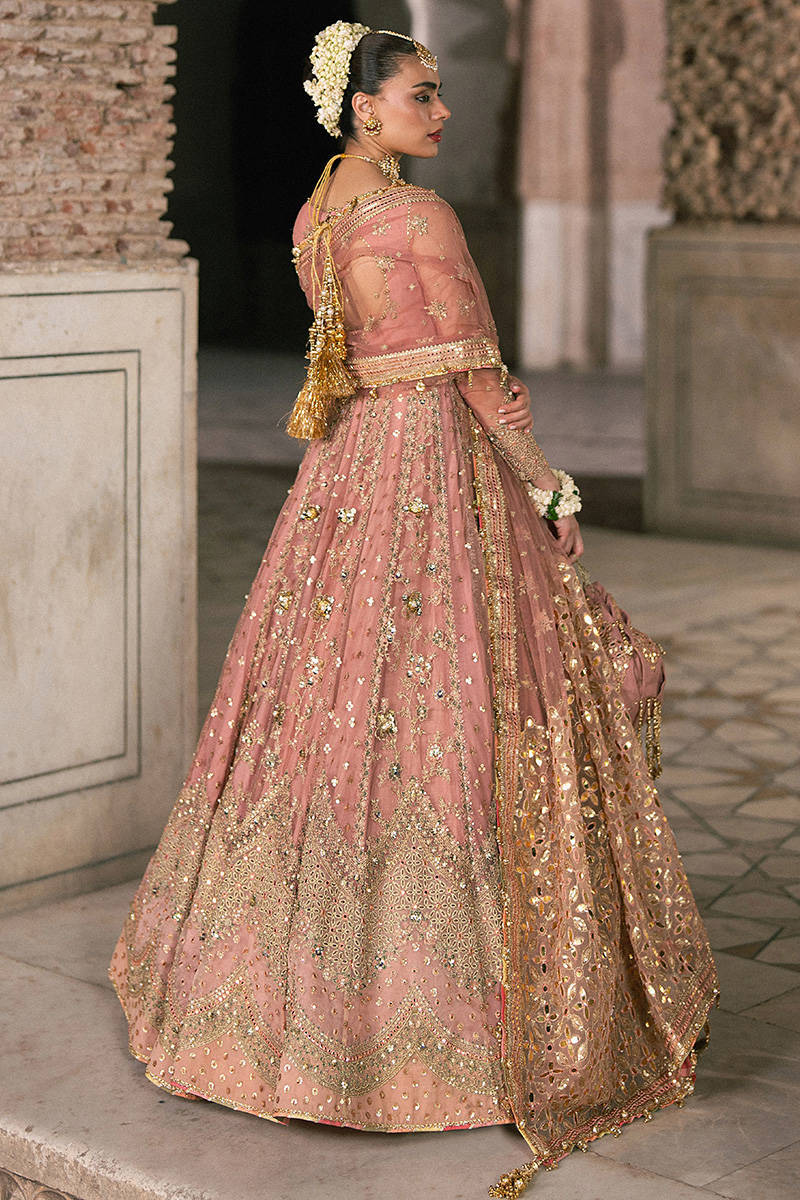 Khushboo MNR pink formal peshwas set with embroidered net panels and dupatta, stitched and available at Pakistanimoda with worldwide shipping.
