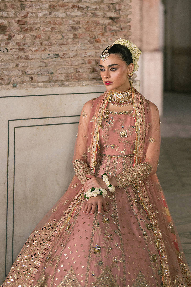 Khushboo MNR pink formal peshwas set with embroidered net panels and dupatta, stitched and available at Pakistanimoda with worldwide shipping.