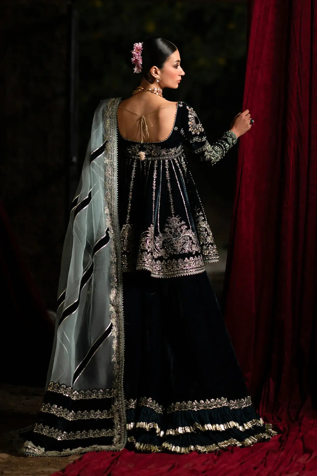 Lehza by Nyra black velvet lehenga with embroidered shirt and organza dupatta.