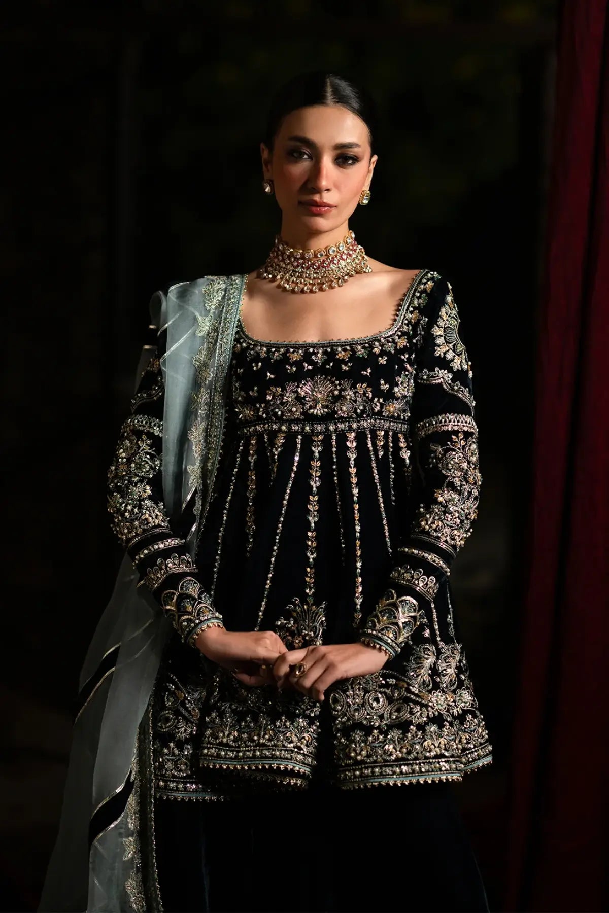 Lehza by Nyra black velvet lehenga with embroidered shirt and organza dupatta.