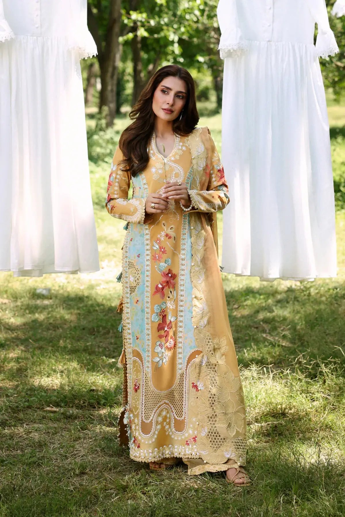 Leial by Afrozeh mustard printed lawn stitched 3PC suit with floral embroidery, organza dupatta and cambric trouser
