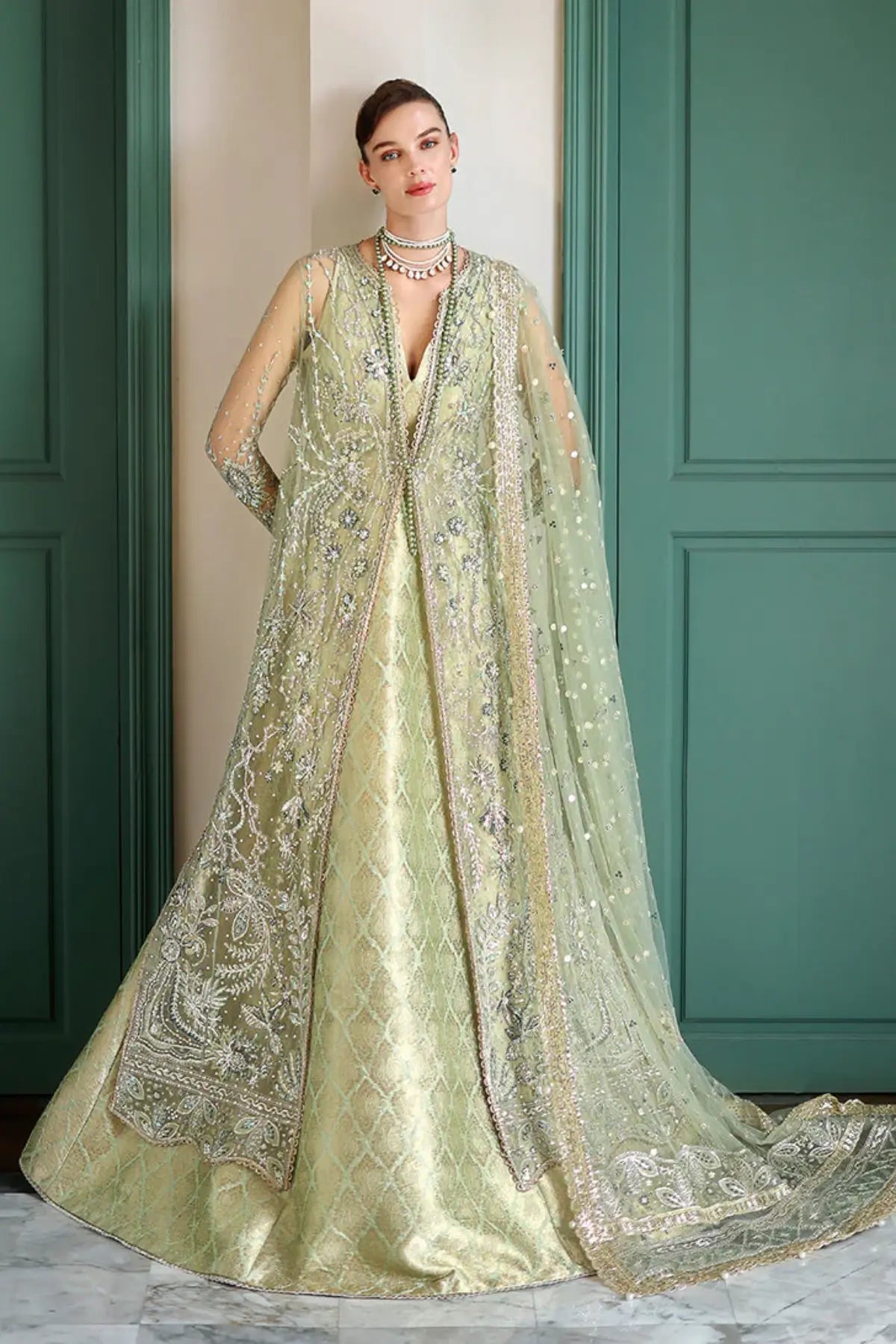 Mushq Lenora luxury stitched sage green gown with lehenga