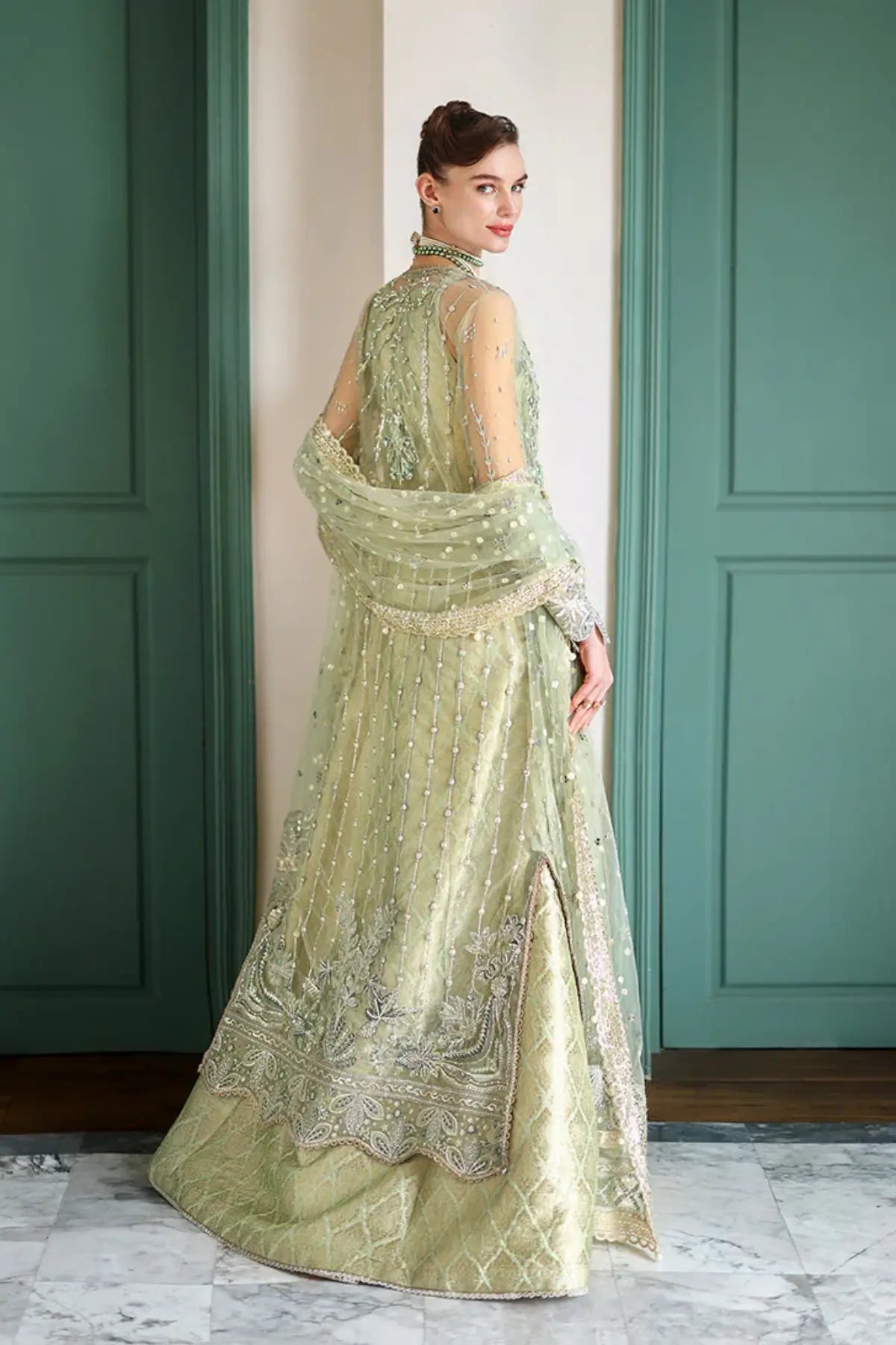Mushq Lenora luxury stitched sage green gown with lehenga