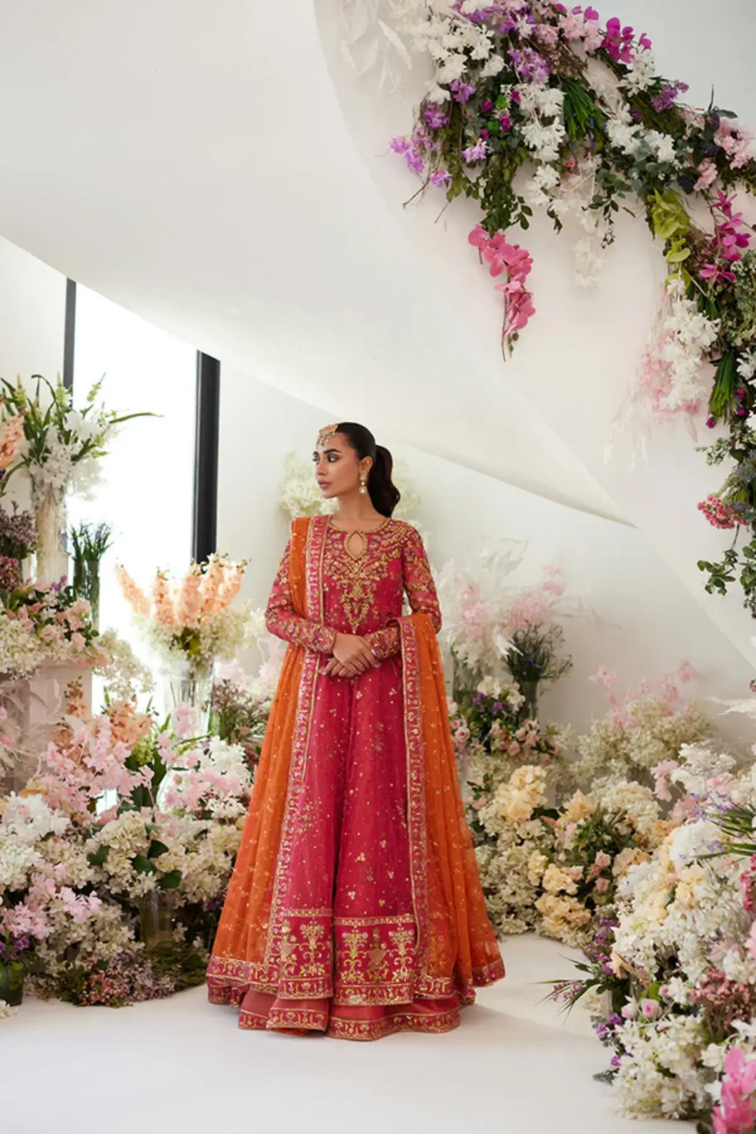 Leya Coral Pink Embellished Net Engagement Pishwas with Gold Work, Lame Tissue Lehenga and Orange Net Dupatta