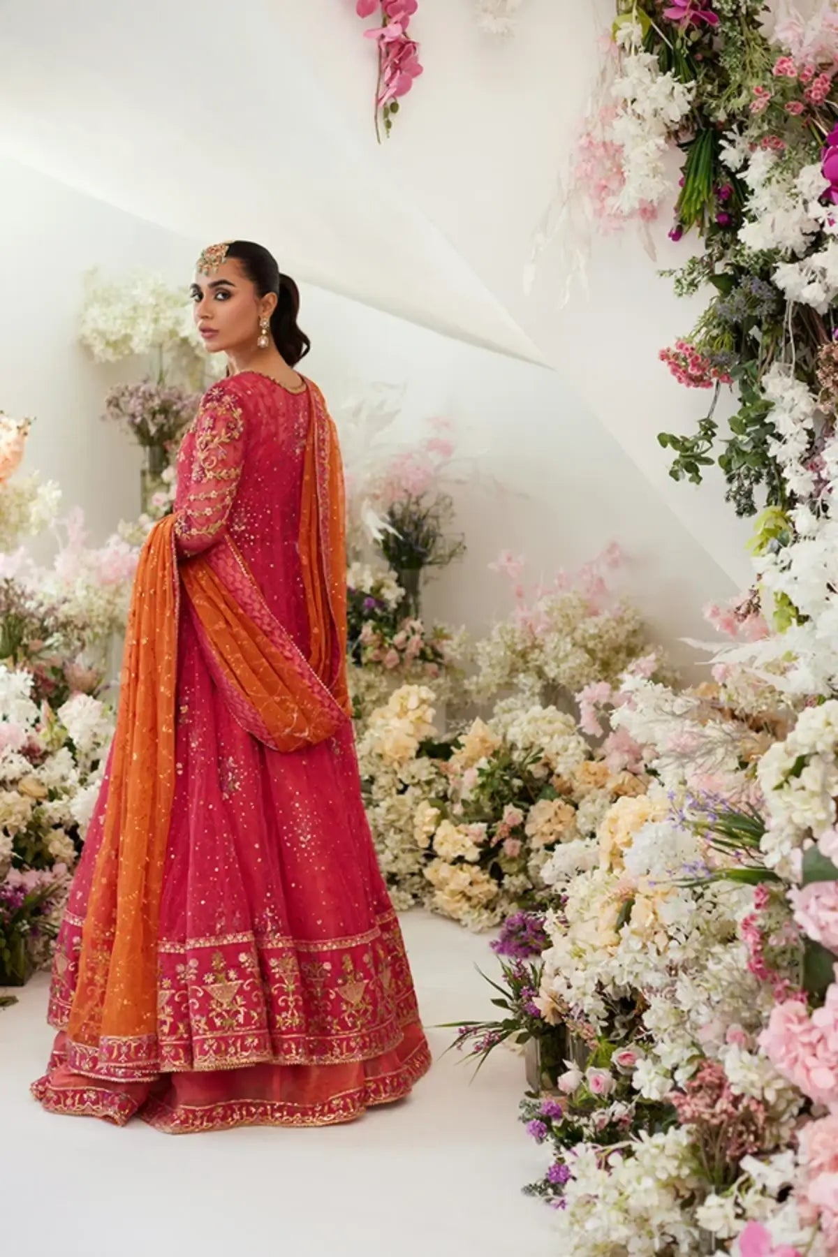 Leya Coral Pink Embellished Net Engagement Pishwas with Gold Work, Lame Tissue Lehenga and Orange Net Dupatta