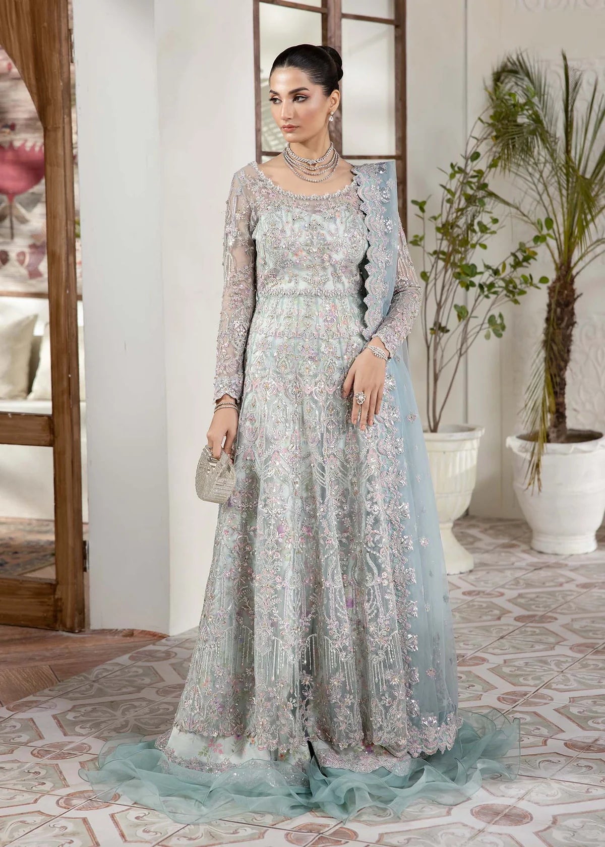 Ice blue embroidered Pakistani pishwas with printed flared trousers and dupatta – elegant Eid wear for women in USA, UK, and Canada.