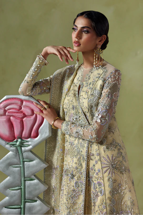 Liora Soraya Lumene Festive Butter Yellow Stitched Outfit with embellished shirt, flared trouser and dupatta, available at Pakistanimoda.