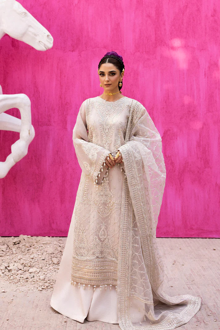 Lumesse off-white organza embroidered formal suit with raw silk trouser and embroidered organza dupatta by Emaan Adeel, perfect for wedding guests.