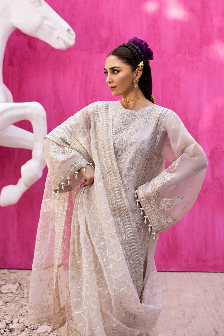 Lumesse off-white organza embroidered formal suit with raw silk trouser and embroidered organza dupatta by Emaan Adeel, perfect for wedding guests.