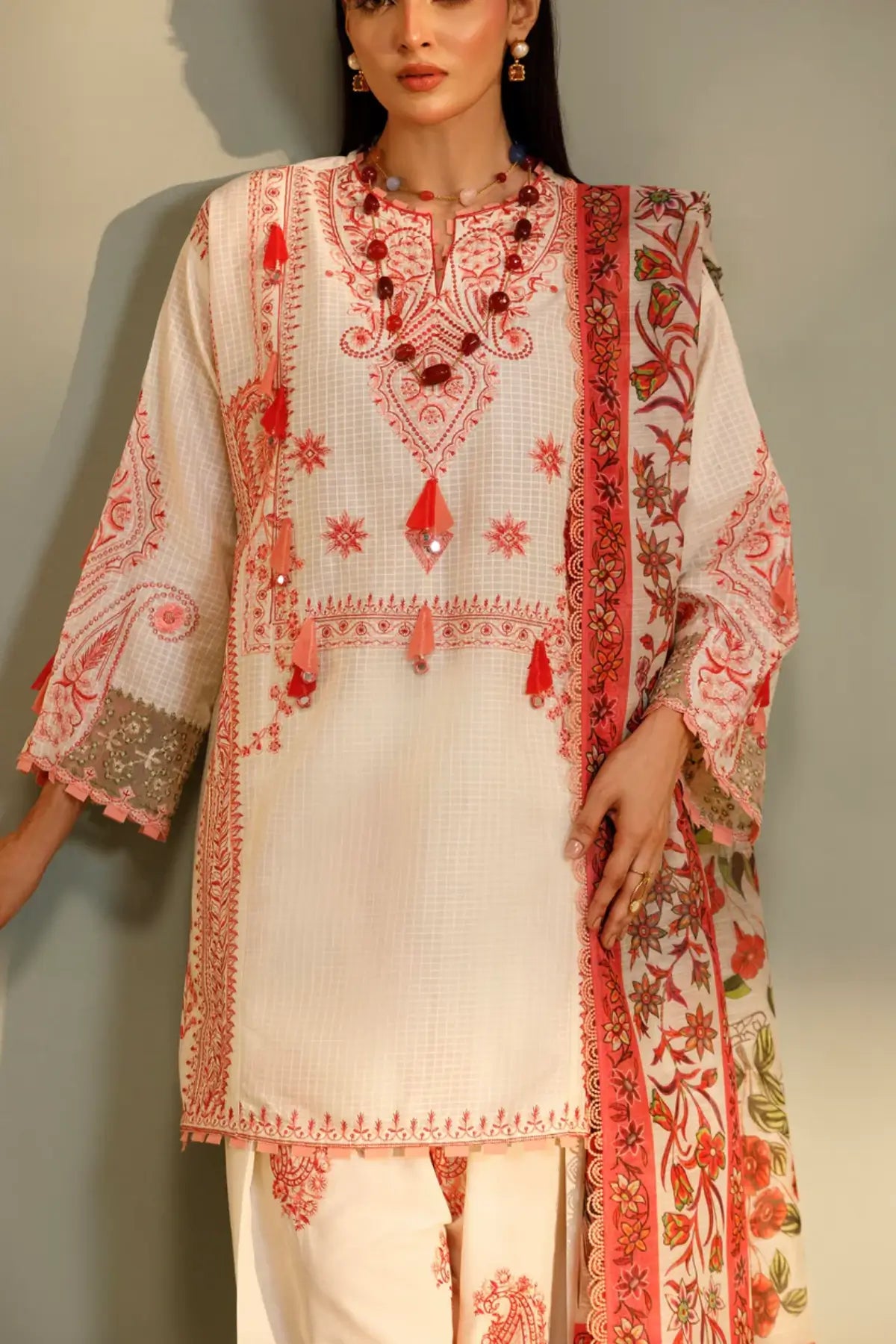 M262-001A white Muzlin stitched suit with embroidered pants and printed woven dupatta