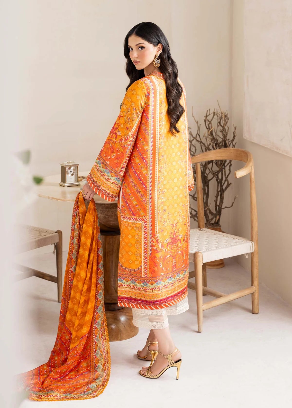 Maesha-Designer orange silk ensemble with traditional accents by-Kanwal Malik