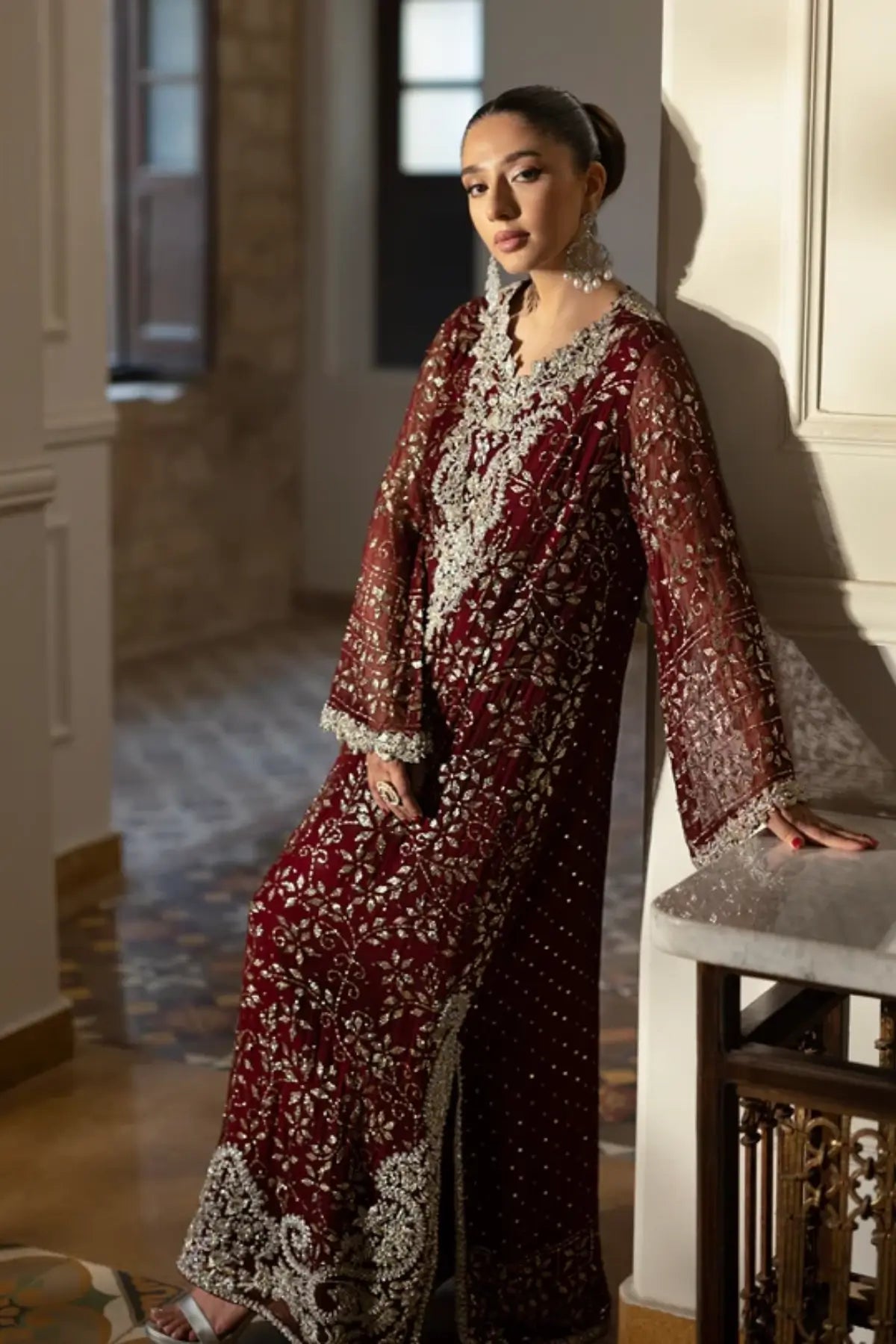 Mahera maroon chiffon embellished stitched reception kaftan with floral Mukesh jaal and intricate Zardozi embroidery
