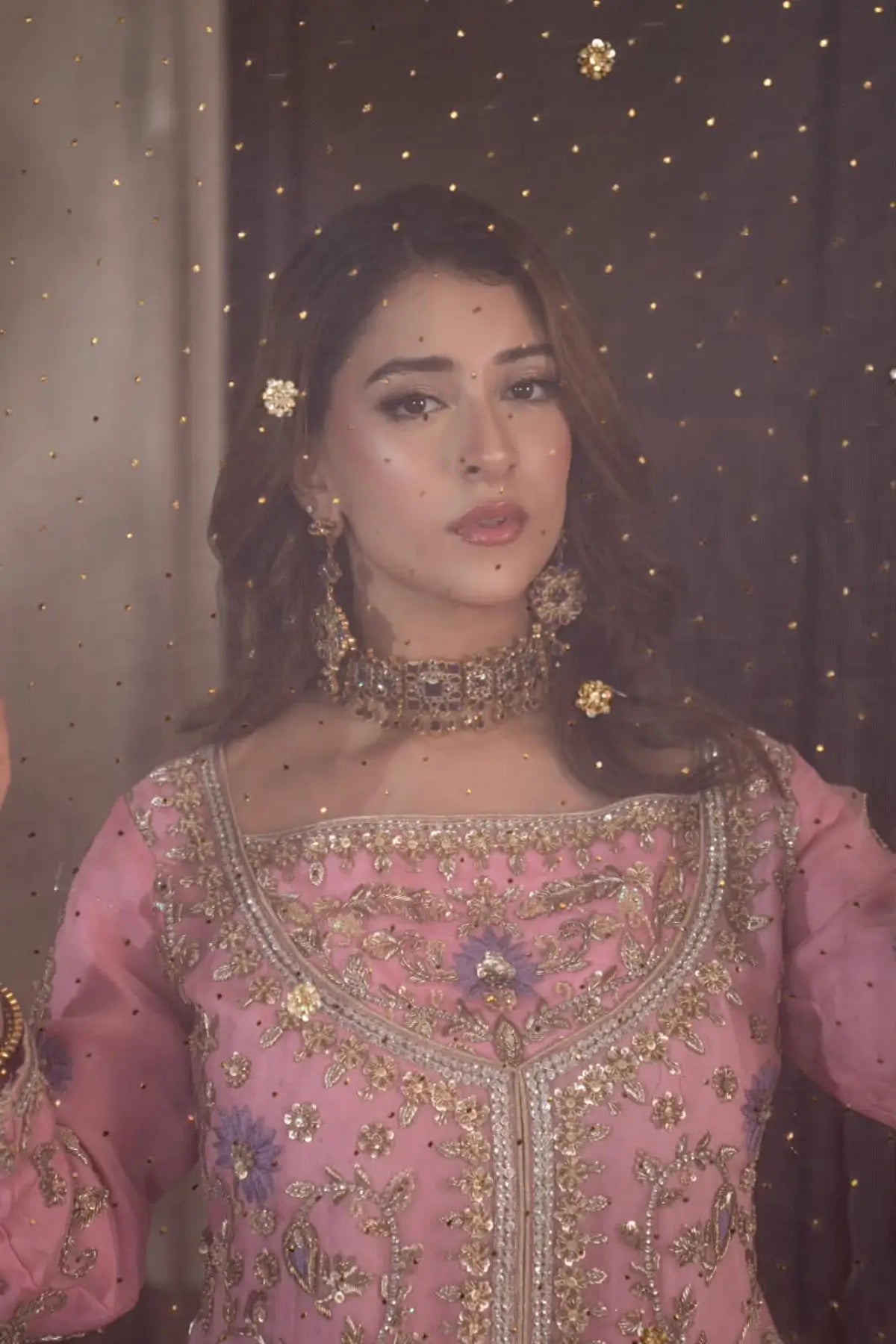 Mahgul powder pink hand embellished organza wedding suit with Kamdani net sharara and lavender net dupatta by MariamRaj