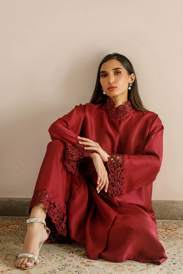 Maroon raw silk dress with cutwork embroidery and pizza-cut design.
