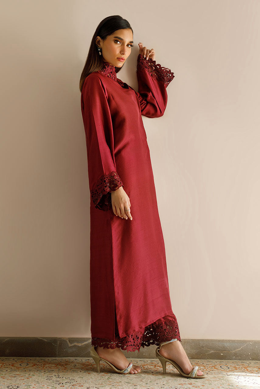Maroon raw silk dress with cutwork embroidery and pizza-cut design.