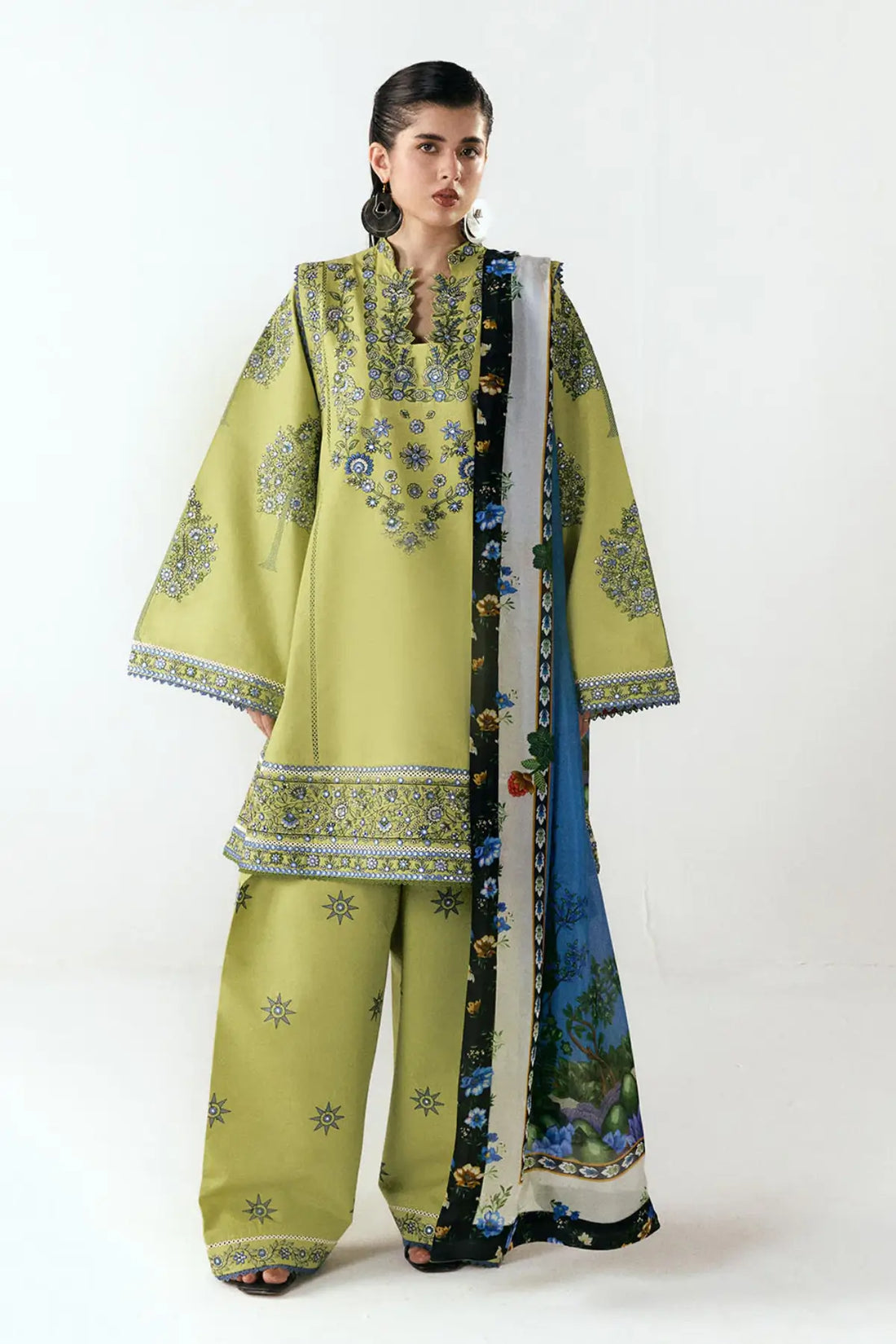 Mai by Jugnu Lahore light green stitched cotton suit with antique blue embroidery