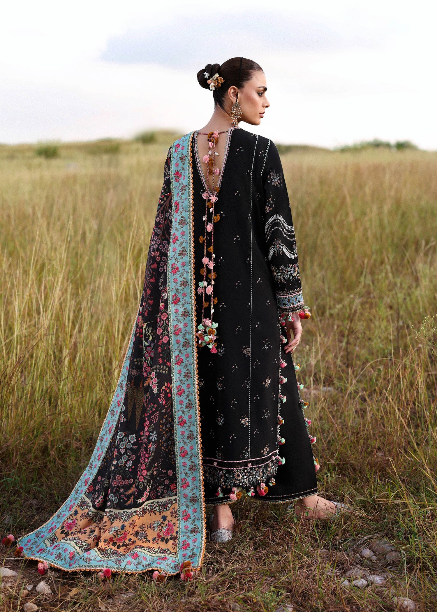Hussain Rehar Malika black embroidered khaddar stitched winter suit with printed wool shawl at Pakistanimoda.
