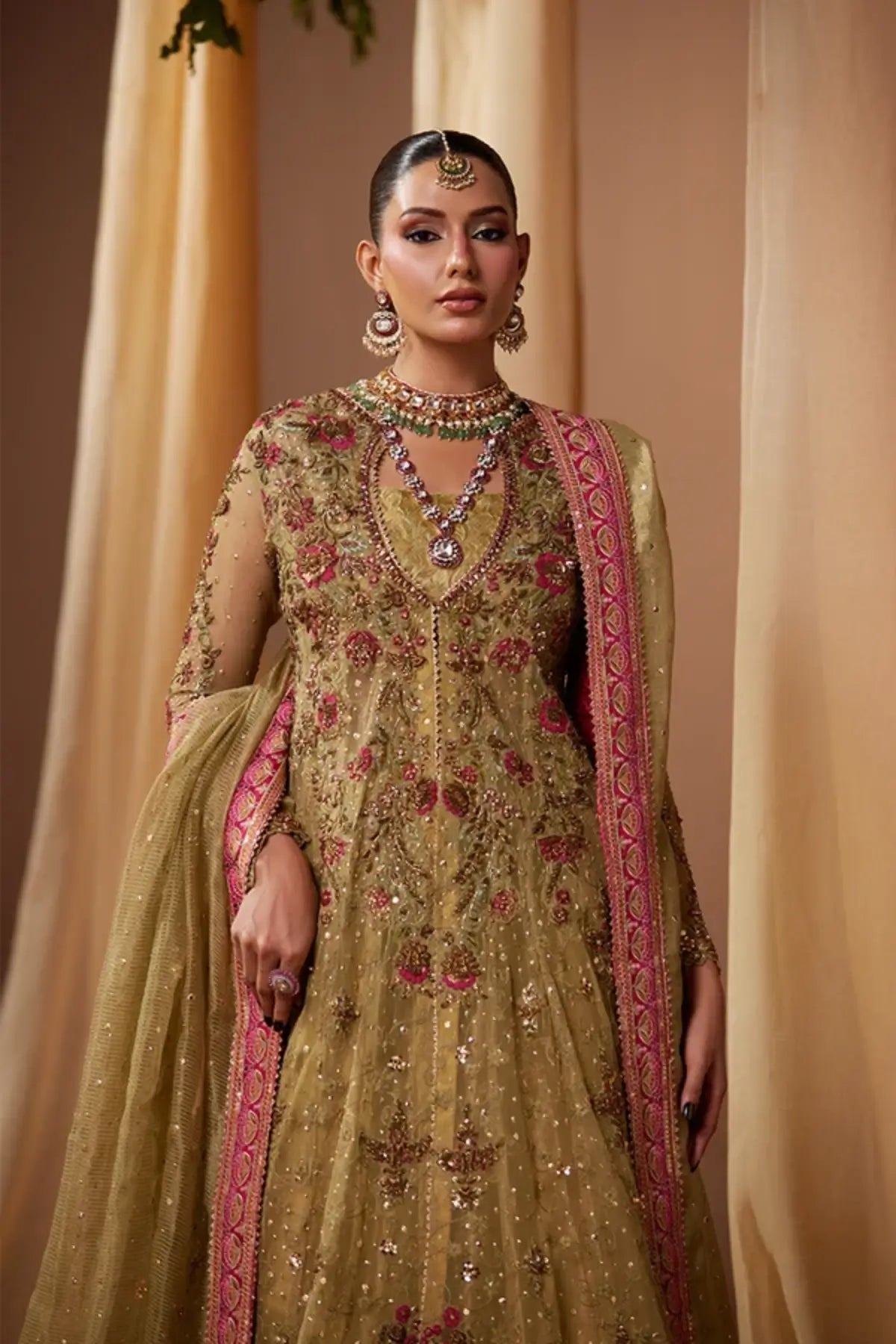 Malka Antique Gold Embellished Net Baraat Stitched Suit with Floral Embroidery, Lame Lehenga, Lame Dupatta and Matching Pouch