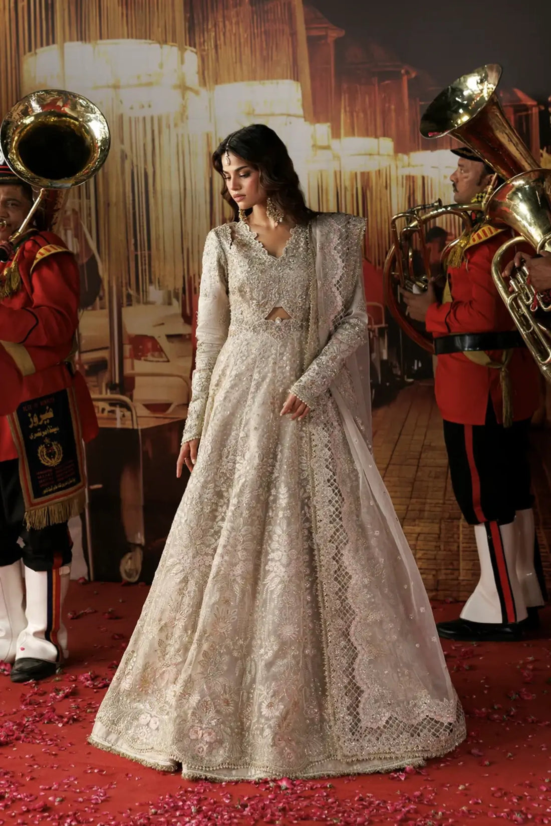 Mannat skin embellished organza stitched bridal Peshwas with silver floral embroidery, zari trouser and detailed organza dupatta