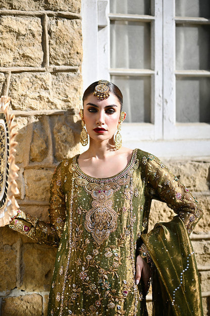 Olive and gold Pakistani occasion wear featuring a straight-cut shirt with zardozi embroidery, hand-embellished izaar, and a shimmering gold lama dupatta – perfect for wedding guests in Canada, USA, and UK.