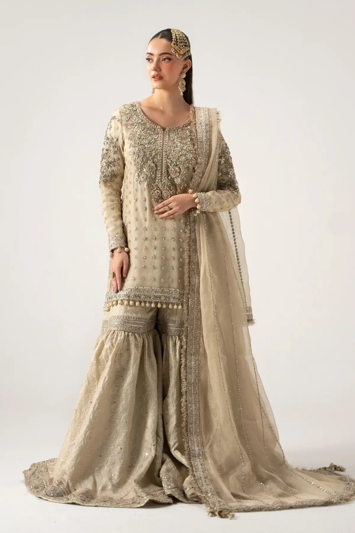 Mayrozeh gold and cream embellished gharara set with zari net shirt, jamawar gharara and dupatta by Maria B