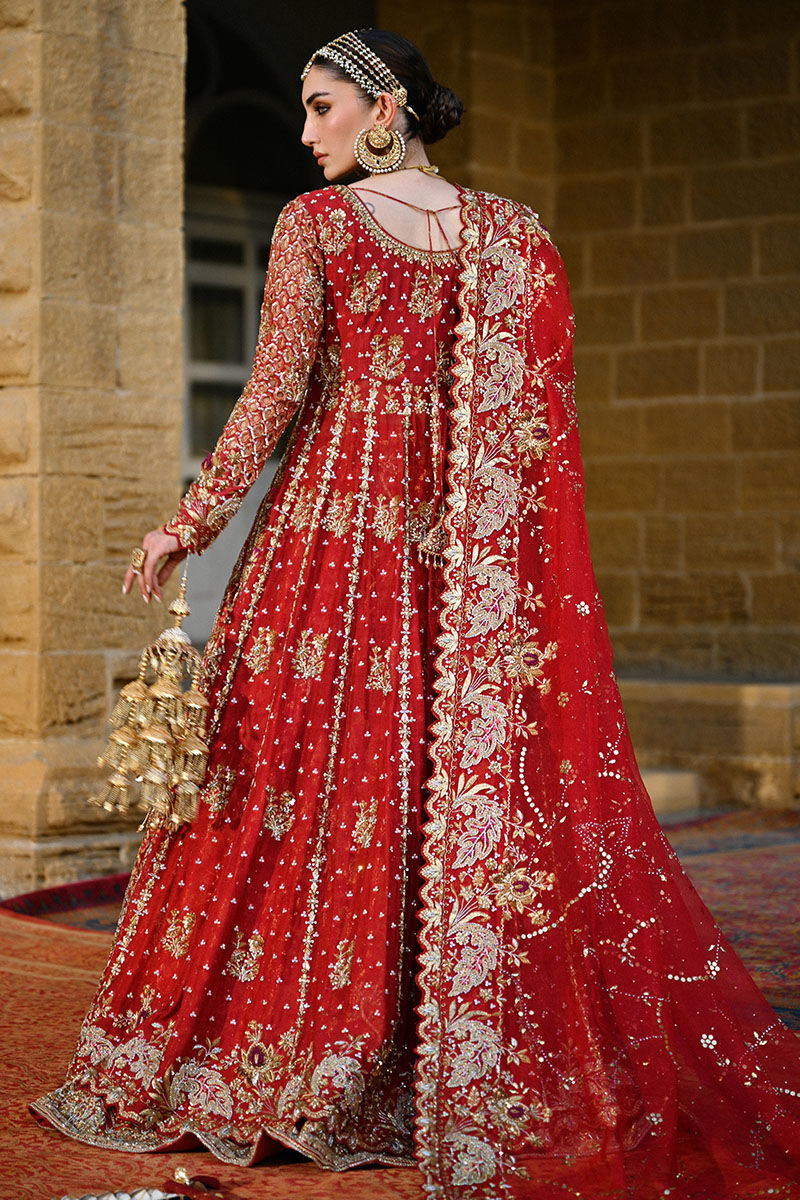 Crimson red Pakistani bridal lehenga with Mughal motifs, heavy hand embellishments, and jaal embroidered dupatta – perfect for brides in USA, UK, and Canada.