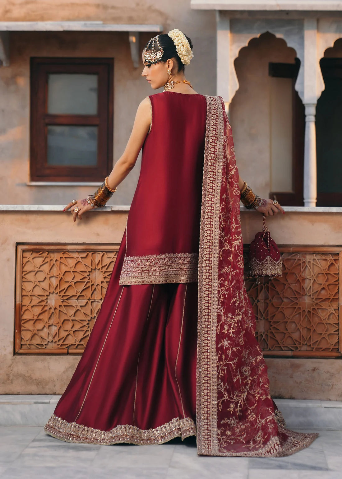 Mehek designer red Korean fabric embroidered outfit with square neckline, silk pants, and organza dupatta by Kanwal Malik from Saheli Luxury Pret Collection.