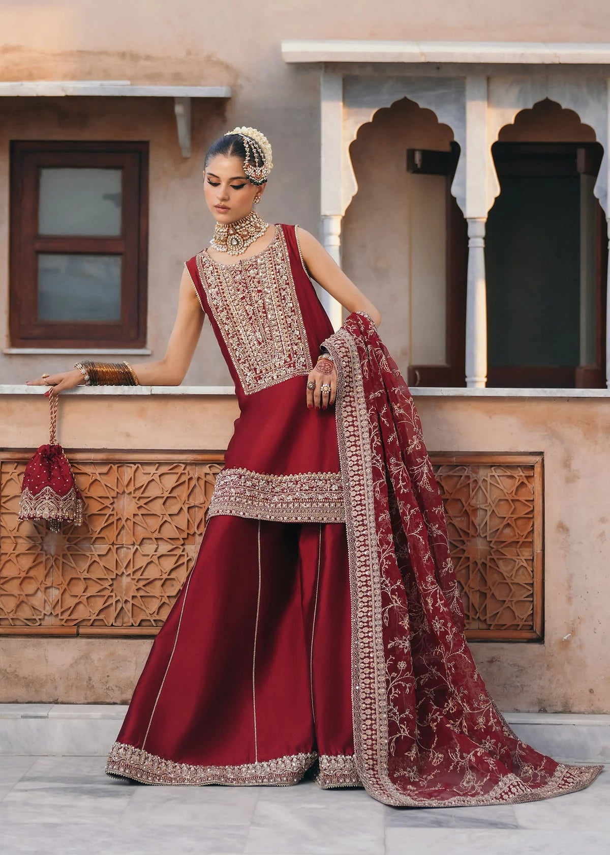 Mehek designer red Korean fabric embroidered outfit with square neckline, silk pants, and organza dupatta by Kanwal Malik from Saheli Luxury Pret Collection.