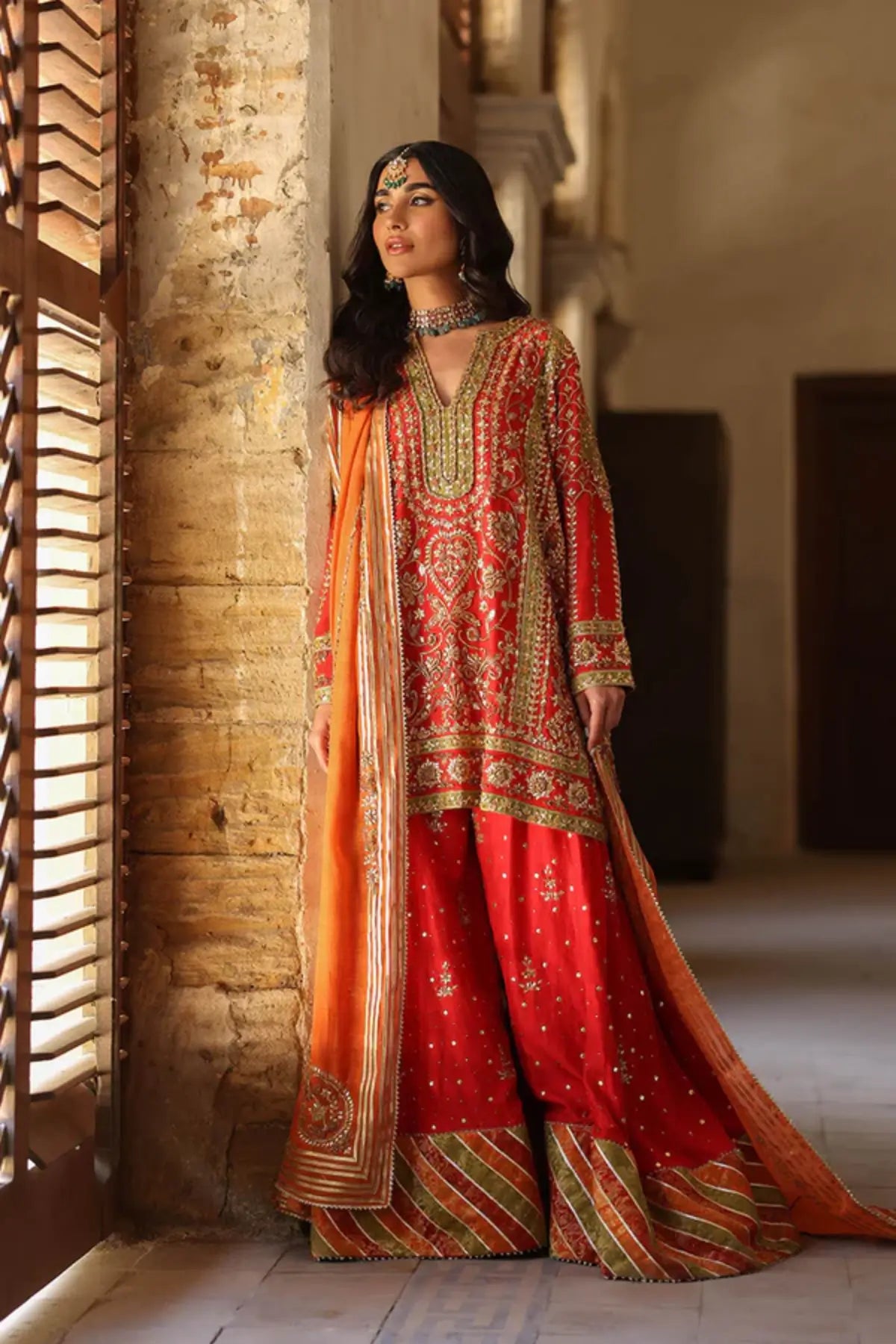 Meher Orange Handmade Silk Net Dholki Shirt with Gold Hand Embellishments, Raw Silk Wide Leg Pants, Silk Net Dupatta and Matching Pouch
