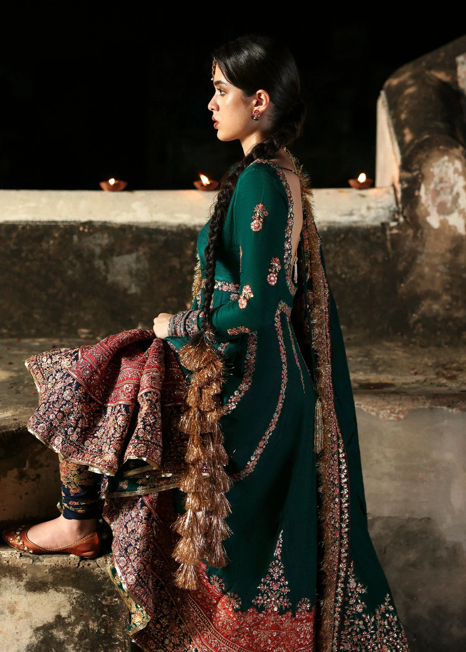 Emerald green raw silk embroidered pishwas with multicolored borders, paired with churidar and embroidered shawl – Hussain Rehar Festive ’25 at Pakistanimoda.