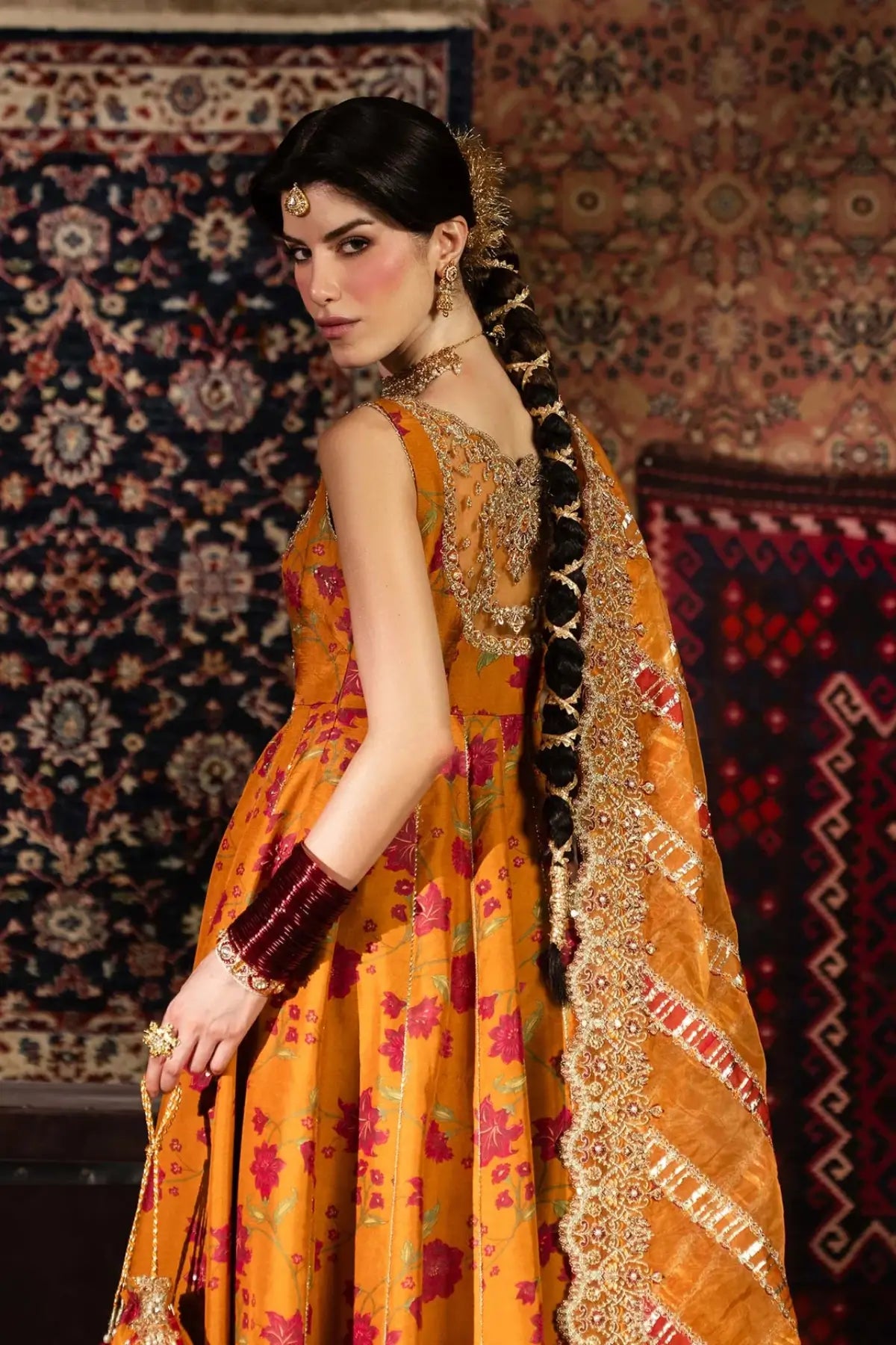 Mehr Kanwal Malik Shehnai rust floral Korean Pishwas ensemble with organza dupatta and PK churidar