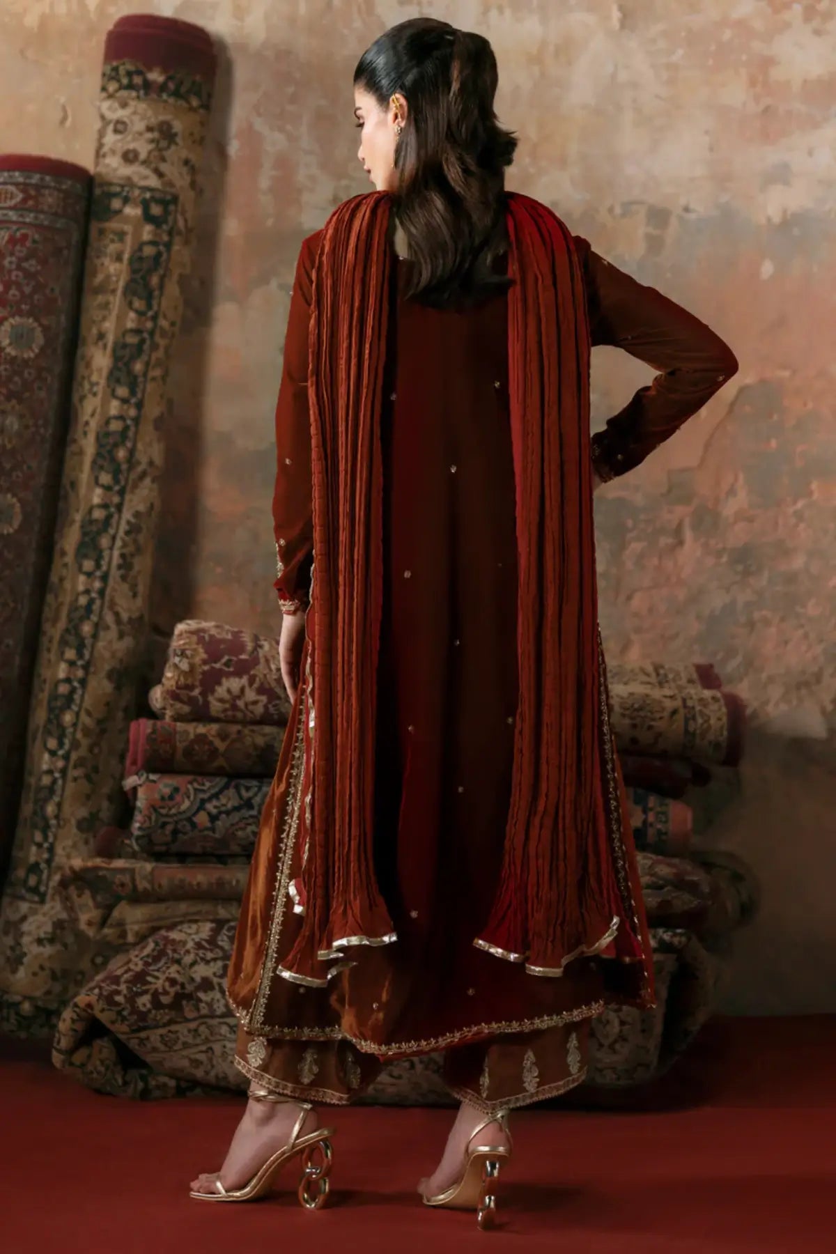 Mehri Maya Pret burnt orange velvet Eid outfit 2026 stitched festive wear.