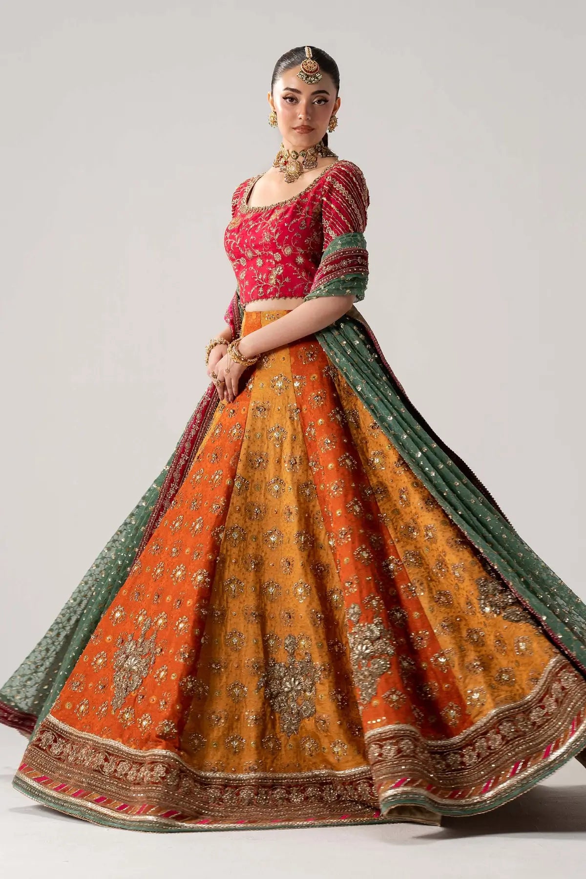 Merjan multicolor Mehndi Jamawar lehenga choli with embellished blouse and net dupatta by Maria B