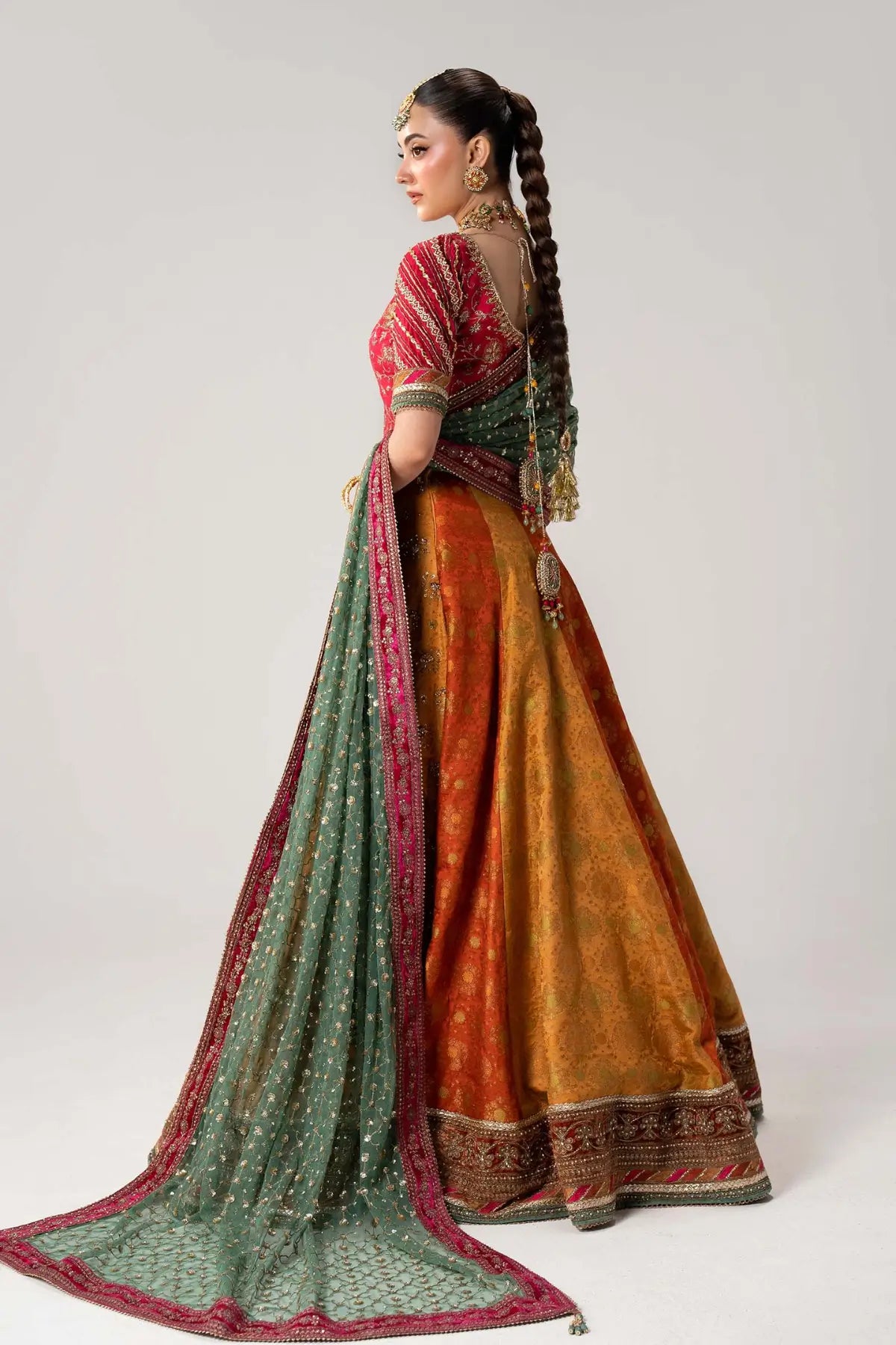 Merjan multicolor Mehndi Jamawar lehenga choli with embellished blouse and net dupatta by Maria B