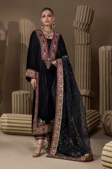 Midnight Tapestry jet black velvet stitched suit with maroon and gold zardozi embroidery, Sheesha silk pants and embellished organza dupatta.