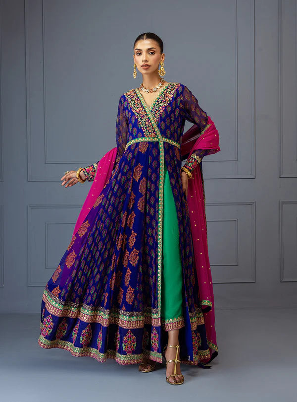 Mihirma by Zainab Chottani violet shirt with rust block prints, hand embroidery, sequin chan, raw silk trousers, and hot pink chiffon dupatta for special occasions.