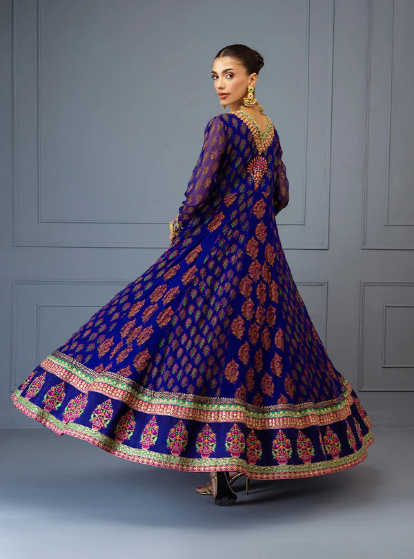 Mihirma by Zainab Chottani violet shirt with rust block prints, hand embroidery, sequin chan, raw silk trousers, and hot pink chiffon dupatta for special occasions.