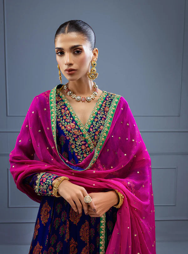 Mihirma by Zainab Chottani violet shirt with rust block prints, hand embroidery, sequin chan, raw silk trousers, and hot pink chiffon dupatta for special occasions.