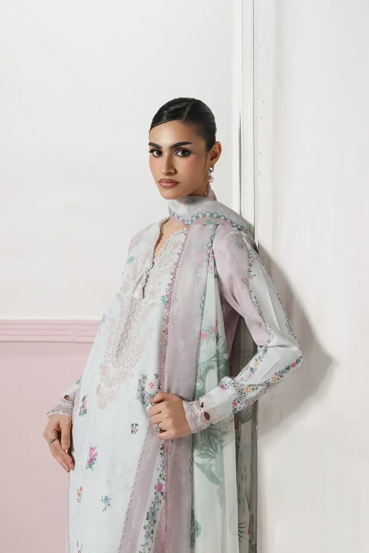 Minal QQP-05(A) by Qalamkar off white lawn stitched 3PC suit with embroidered neckline, printed chiffon dupatta, and plain cotton trousers.